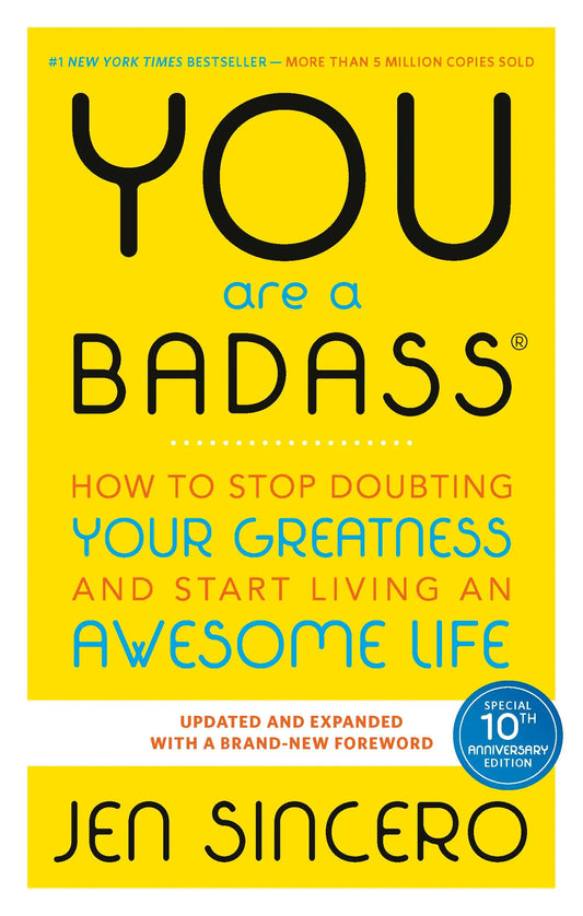 You Are a Badass" by Jen Sincero. The cover features a bright yellow background with the title "YOU are a BADASS ®" prominently displayed in large black and white letters. Below the title, the subtitle reads "HOW TO STOP DOUBTING YOUR GREATNESS AND START LIVING AN AWESOME LIFE" in a mix of orange, blue, and black text. At the bottom, the author's name, "JEN SINCERO," is presented in bold lettering. A circular badge in the bottom right corner indicates "SPECIAL 10TH ANNIVERSARY EDITION." The overall design i